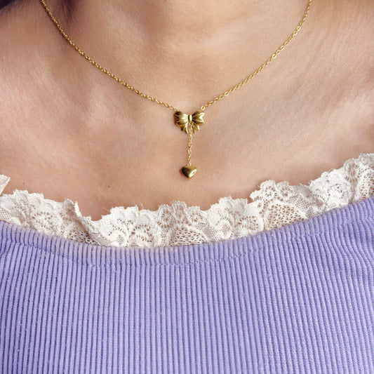 BOW NECKLACE WITH TINY HEART